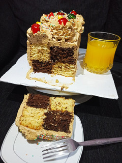 A picture of Coconut poppy seed and chocolate cake....