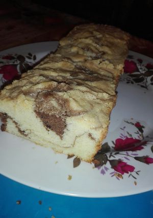Una foto de Budín de limón marmolado sin t.a.c.c😍
