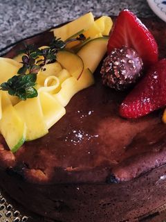 Una foto de Tarta de Queso con Mango y Chocolate