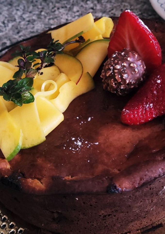 Una foto de Tarta de Queso con Mango y Chocolate