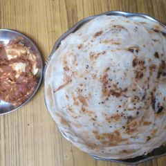 Crispy Parota and Egg curry A picture of Crispy Parota and Egg curry.