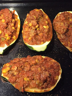 Una foto de Zapallitos italianos rellenos con verduras