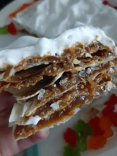 Una foto de Torta rogel fácil y sin horno