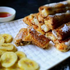 A picture of Peanut Butter French Toast Roll-Ups With Banana & Almond Filling.