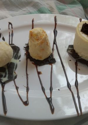 A picture of Rosted almomd mava kulfi and mango mava kulfi.