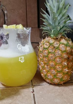 Una foto de Agua de piña natural
