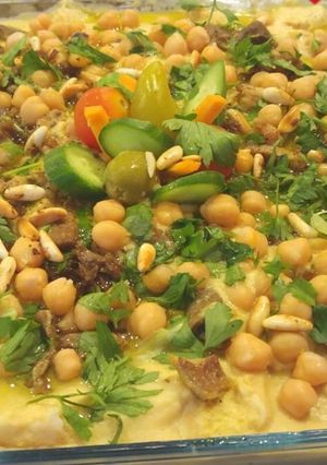 A picture of Hummus with Tahini and Olive Oil.