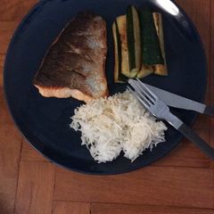 A picture of Pan-seared salmon with Zucchini.