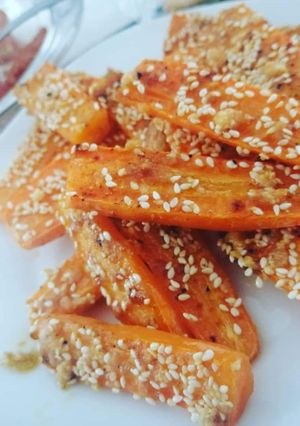 Foto di Carote al forno con paprika, parmigiano e semi di sesamo