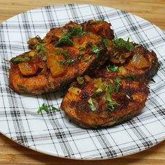 A picture of Tava fry fish in mustard oil.