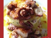 Una foto de pulpo con parmentier de patata