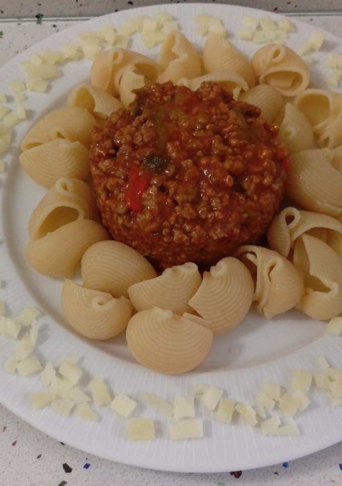 Una foto de Lumaconi con carne salteada con tomate y queso viejo