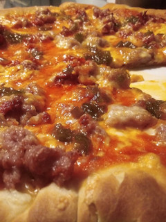 Una foto de Pizza agridulce