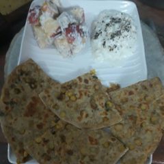 Diabetes friendly parantha with curd and salad A picture of Diabetes friendly parantha with curd and salad.