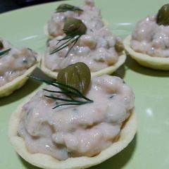 A picture of Smoked salmon paté with capers, lime and fresh dill .