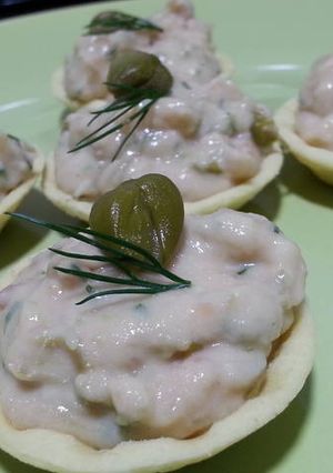 A picture of Smoked salmon paté with capers, lime and fresh dill .