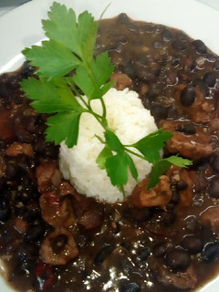 Una foto de Feijao con timbal de arroz