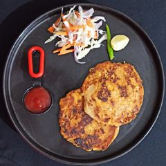 A picture of Peri peri paneer pinwheel Paratha.