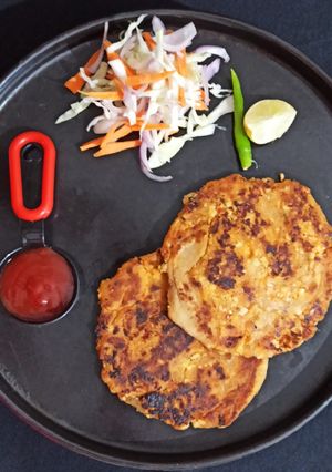 A picture of Peri peri paneer pinwheel Paratha.