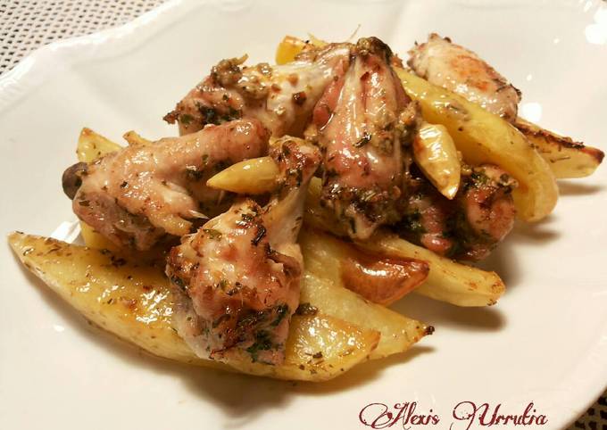 Alitas de pollo, con gajos y patatas al horno, en salsa de mostaza Receta  de Alexis Urrutia- Cookpad