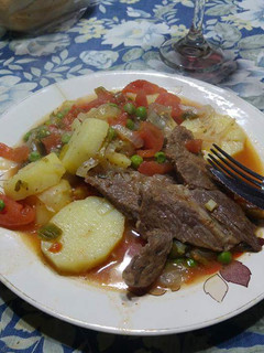 Una foto de Bifes a la Criolla