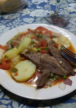 Una foto de Bifes a la Criolla