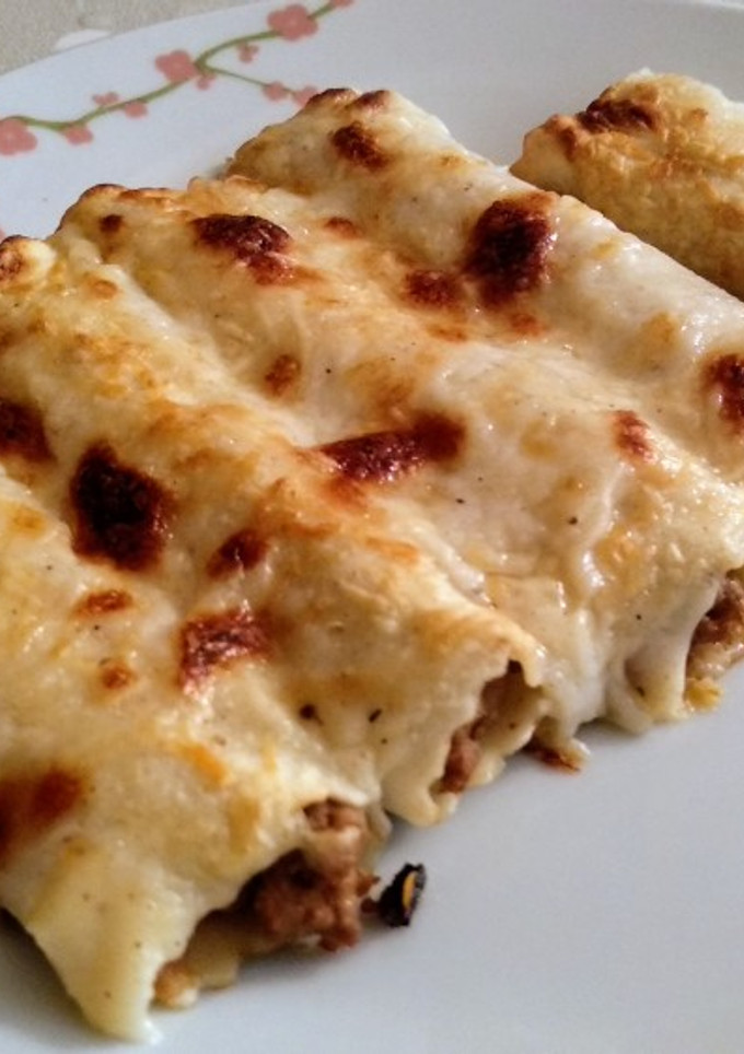 Una foto de Canelones de carne con bechamel