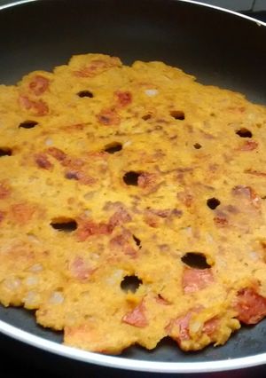 A picture of Tomato And Onion Thalipeeth.