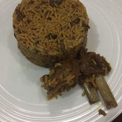 A picture of Jellof rice with palm oil and daddawa # Abuja.