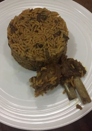 A picture of Jellof rice with palm oil and daddawa # Abuja.