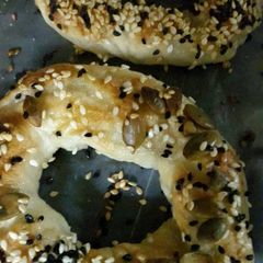 A picture of Pizza dough bagels .