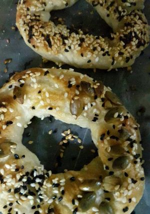 A picture of Pizza dough bagels .