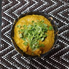 A picture of Lauki sabji (coconut gravy).