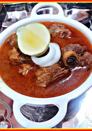 A picture of Onion mutton masala.