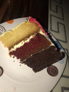 A picture of Vanilla, chocolate and Red velvet cake.