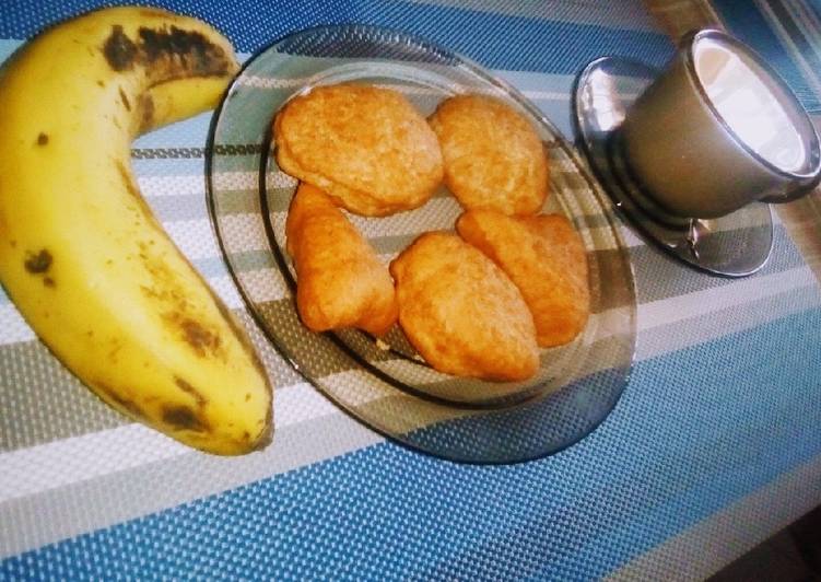 Tea..taken with banana,lemon mandazi's#breakfast themechallenge