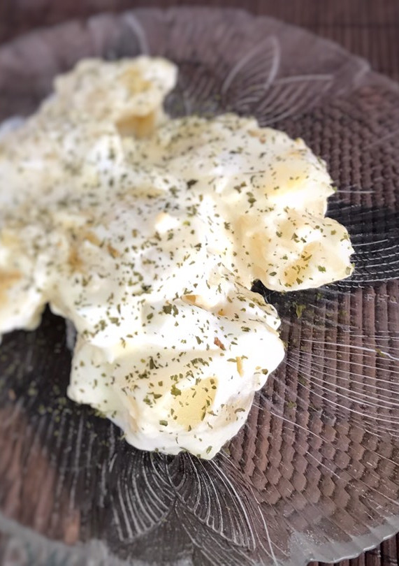 Una foto de Papas alioli