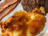 Huevos estrellados en sofrito
