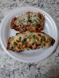 Chicken parmesan with a pasta side dish