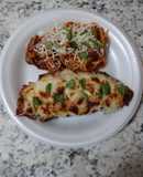 Chicken parmesan with a pasta side dish