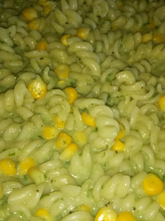 A picture of Mini fusilli spinach pasta in white sauce.