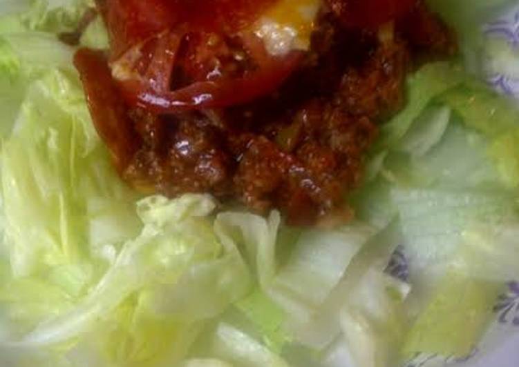 Recipe of Favorite Pizza casserole on a bed of lettuce