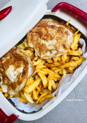 A picture of Chips / fries & egg🥔🥚🍳.