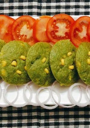 A picture of Spinach Corn Idlies.
