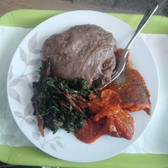A picture of Vegetable with stew and amala.