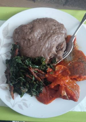 A picture of Vegetable with stew and amala.