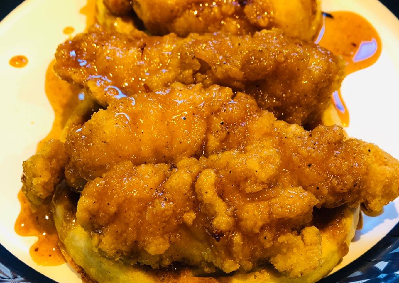 Chicken and waffles with spicy maple sauce