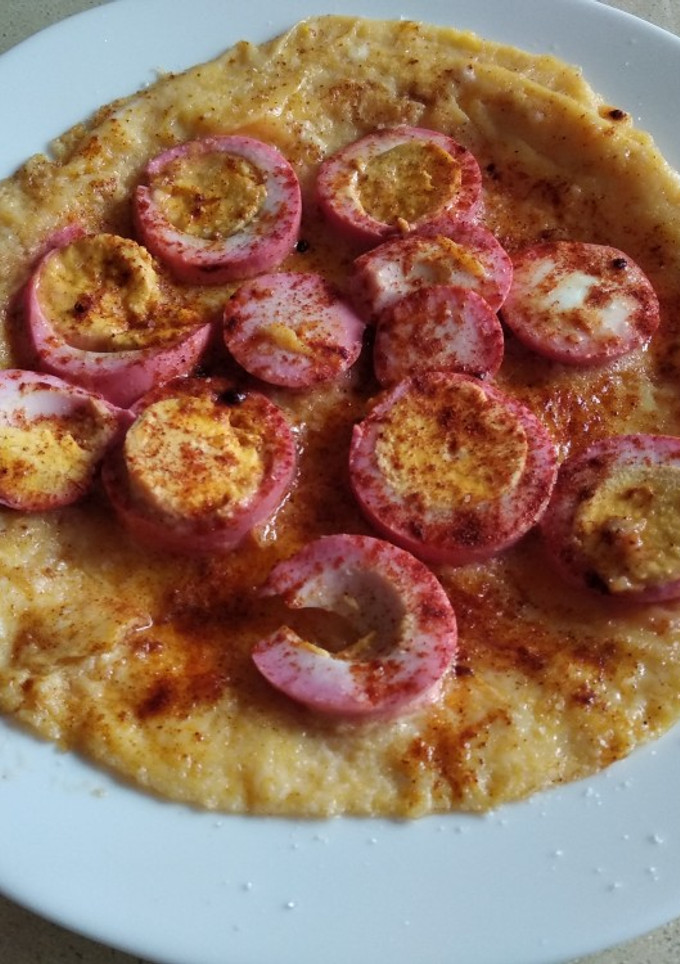 Una foto de Tortilla crepé con huevo duro rosado
