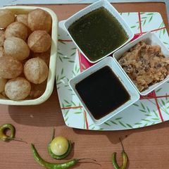 A picture of Homemade puris for pani puri.