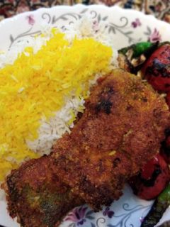 عکسی از دستور پلو ماهی همراه گوجه و قارچ و فلفل کبابی